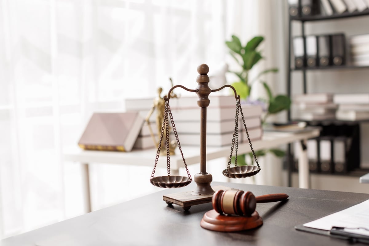 Justice statue and gavel at a law firm